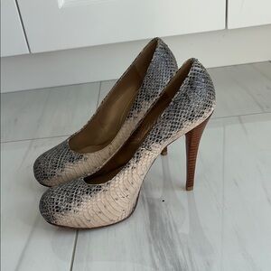 Stuart Weitzman Two Tone Watersnake Platform Pumps 
7.5